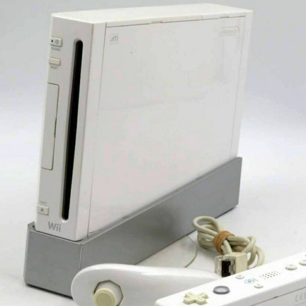 NINTENDO WII CONSOLE WITH 1 CONTROLLER ANDALONG WITH  THE GAME SUPER MARIO BROS
